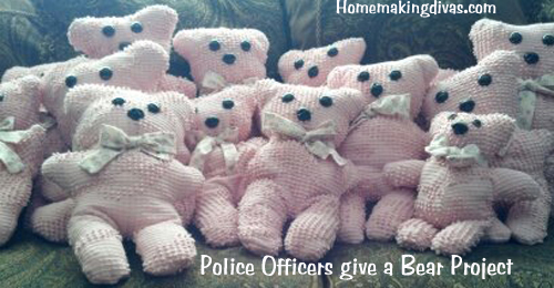 Police Officers give a bear